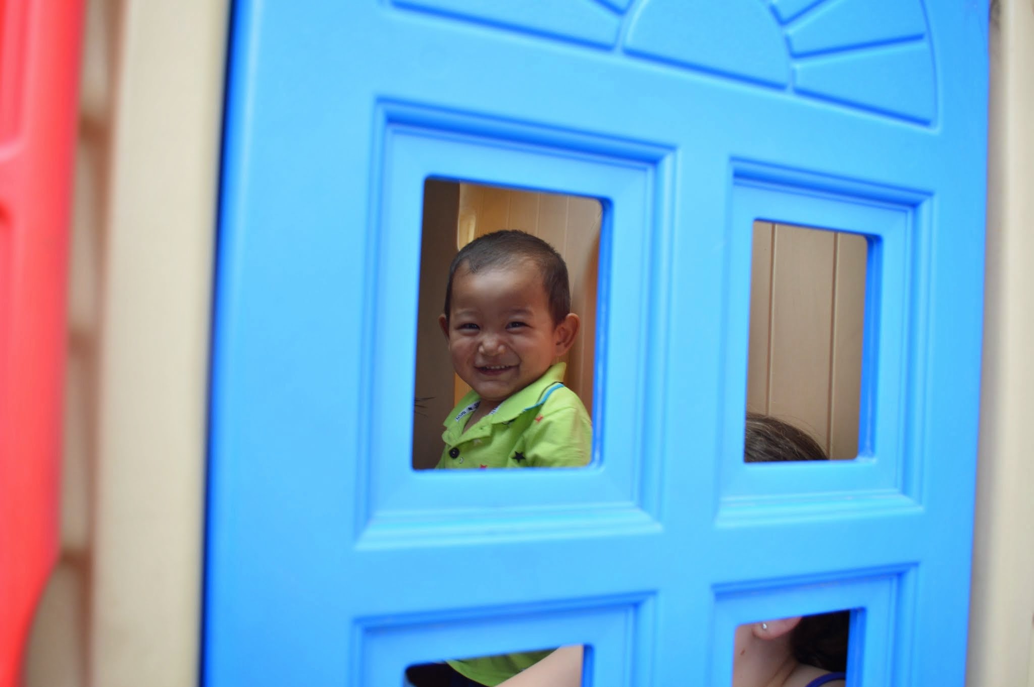 happy boy smiling in playhouse | About Morning‌ ‌Star‌ ‌Foundation‌ | About Us | Morning Star Foundation